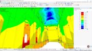 Vnitřní pohled na statickou analýzu chrámu v programu RFEM společnosti Dlubal s celkovými deformacemi při působení vlastní tíhy. Klenba a sloupy vykazují různé úrovně posunu znázorněné pomocí barevné stupnice.