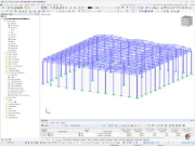 Počítačový model ocelové haly s příhradovými vazníky navržený v programu RFEM pro statické výpočty.