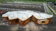 Moderní servisní středisko Asijských her v Chang-čou z ptačí perspektivy. Architektonický skvost v Chang-čou.
