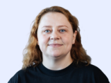 Portrét Marie, zaměstnankyně společnosti Dlubal, která působí profesionálně.