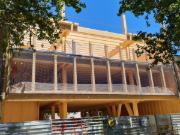 El edificio de madera en construcción (© Estudi M103)