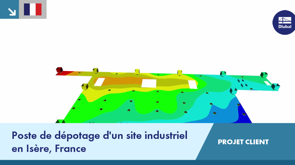 Site industrielle en Isère avec une grande zone de déchargement et des camions sur le site