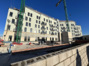 Bâtiment résidentiel avec ossature métallique industrialisée en construction (© AFCA Teccon)