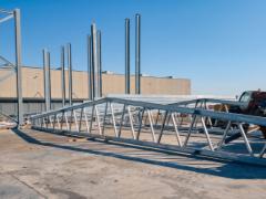 Treillis de toiture d’un entrepôt industriel situé à Macchiareddu, en Sardaigne, photographiée par Profilsider SpA.