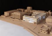 Un istituto nautico unisce design ecologico e interni flessibili utilizzando pietre locali.