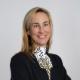 A professional portrait of Helena Goñi Barbarin, showcasing customer satisfaction in the engineering field.