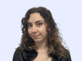 Elisabetta Bastianello è impiegata, rappresentata in un contesto professionale all'interno dell'azienda.