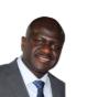 Portrait professionnel d'Alioune Diedhiou avec un éclairage neutre